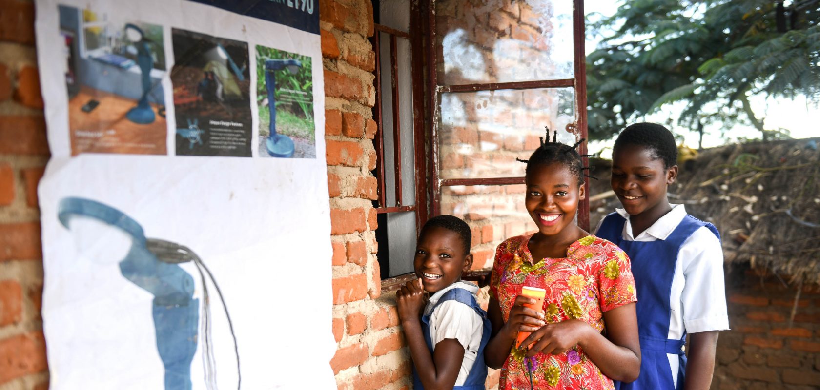 Aliya and her firends rent a torch in Malawi.