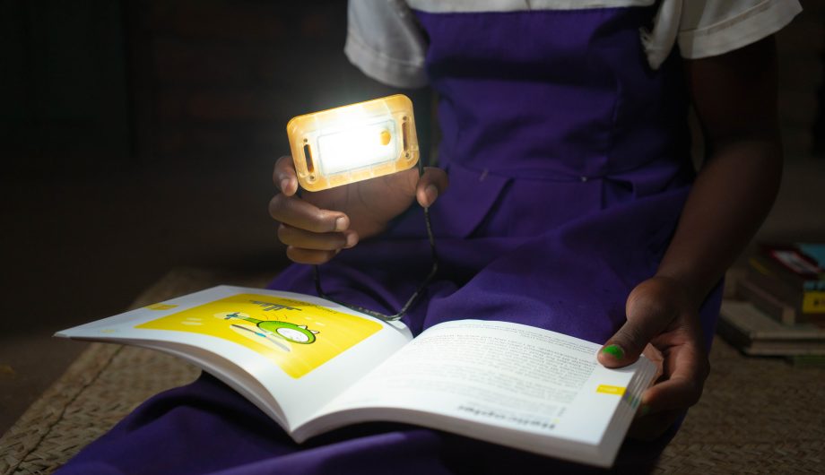 A solar light above a book.