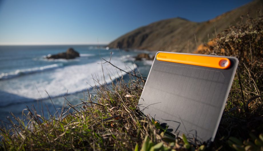 Biolite panel charging by the beach